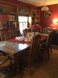 Dinning Room table with three leaves and eight chairs, four chairs with arms and four without. Lots of great books