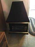 Metal fireplace insert with electric logs