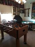 Game Room showing the Foosball table and game table