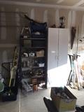 Metal shelving, metal work benches, utility cupboard