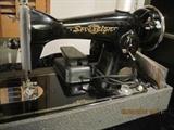 Late 1940's Sovereign sewing machine with booklet