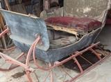 ANTIQUE SLEIGH, FRAME IN WONDERFUL CONDITION, AND HAS HORSE HARNESS TOO.