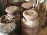 SOME OF MANY MILK CANS