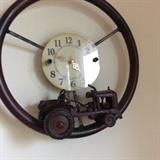NEAT CLOCK MADE FROM A TRACTOR STEERING WHEEL WITH AN ANTIQUE TOY TRACTOR