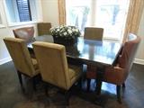 Dark wood dining table, 6 dark sage chairs with head-to-head nail trim, 2 brown leather captain's chairs