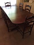 Nice 7' dining room table with four leaves and six chairs