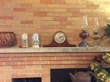 McCoy pottery, clocks, Ingraham mantel clock and oil lamps