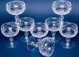 Eye-catching Waterford crystal 8 piece stemware tall sherbet or short champagne glasses. Created in precisely cut, premium quality, Irish crystal; each piece features the vintage "Colleen" pattern with diamond and thumbprint designs. All are acid etched with the “Waterford” hallmark on the bottom; in excellent condition with no damage or repairs. Each glass measures 4.5" tall x 3.75" top diameter.  Tag Words: giftware, glassware, tableware See more Waterford in lot #s 14, 61, 149, 181, 256, 332, and 386.