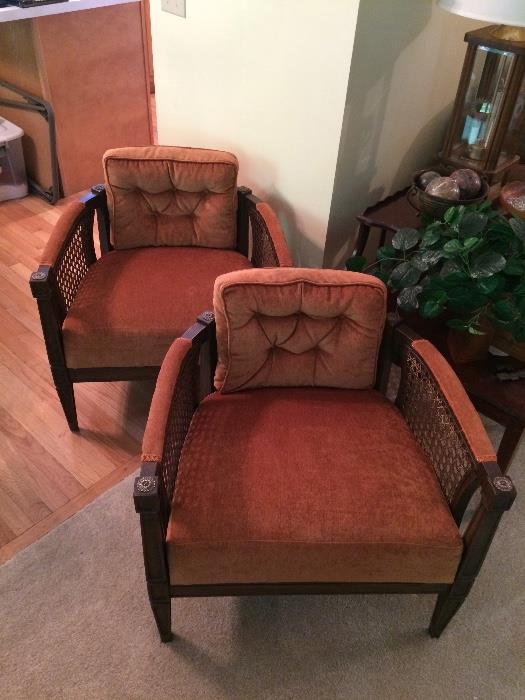 Two matching vintage caned and upholstered chairs