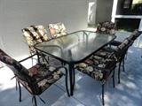 a 7 pc outdoor set with beautiful cushions and you can add 2 end chairs and make it a 9 pc set.. see other photos..