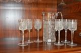 Cut crystal pitcher with stemware