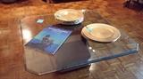 Glass top coffee table with gold base
