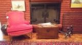 Nice arm chair, small trunk, andirons