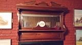 Beautiful mantle with beveled mirror, Howard Miller clock