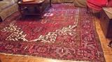 Antique Oriental rug (12ft 4in X 8ft 11in)