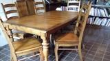 Oak dining table with 6 chairs - excellent "like new" condition. The table is very heavy and measures 6 ft. by 44 in. and has two 12 inch leaves.