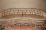 Henredon-styled vintage sofa in pristine condition. Signature curved shape, tufted back and curtain front edge. No stains.