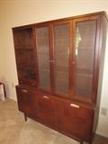 Mid-century hutch often used as a china cabinet /buffet but a classic bookcase/curio shelf piece. Beautiful condition.