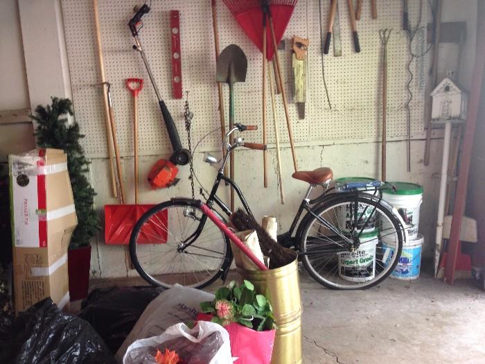 Garden tools, Christmas trees, silk flowers and leaves, and ladies bicycle