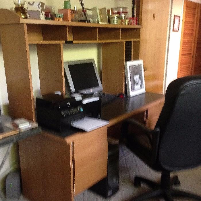 Computer desk, office chair, computer, and home decor
