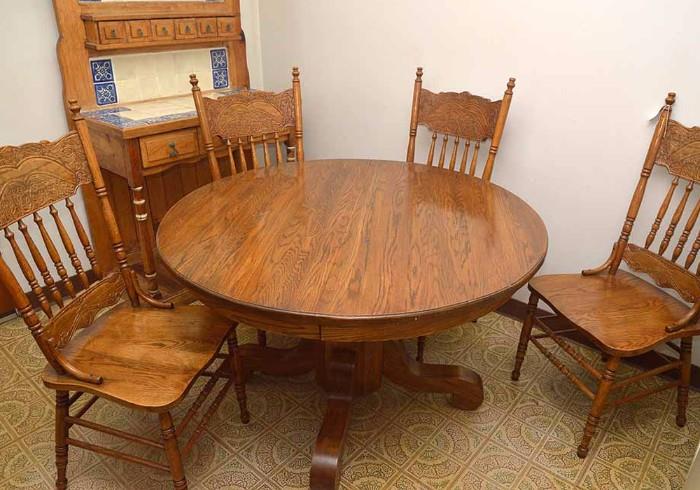Vintage Oak Dining Table and 4 Oak Carved Chairs (there is an extra leaf for the table)