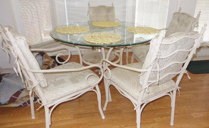 Dinette set with round glass top 4 iron chairs and iron base