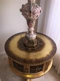 Round gold ornate table