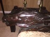 Serpent carved table