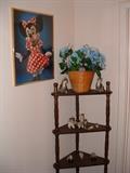 TONS of disney collectibles in this house !!