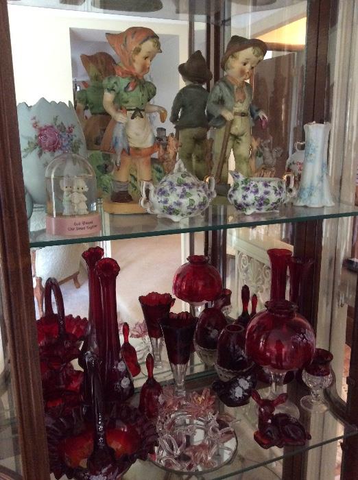 Collectible figurines, cranberry glass