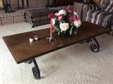 Wrought iron and wood cocktail table 