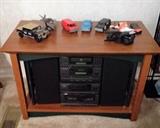 tv stand, stereo, model cars