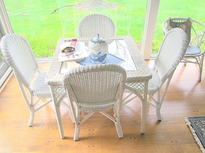 Wicker breakfast table and four chairs.