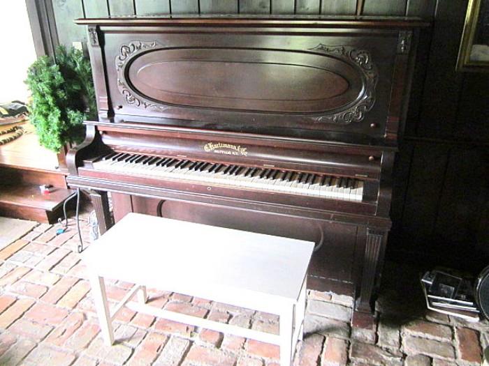 Antique upright piano.