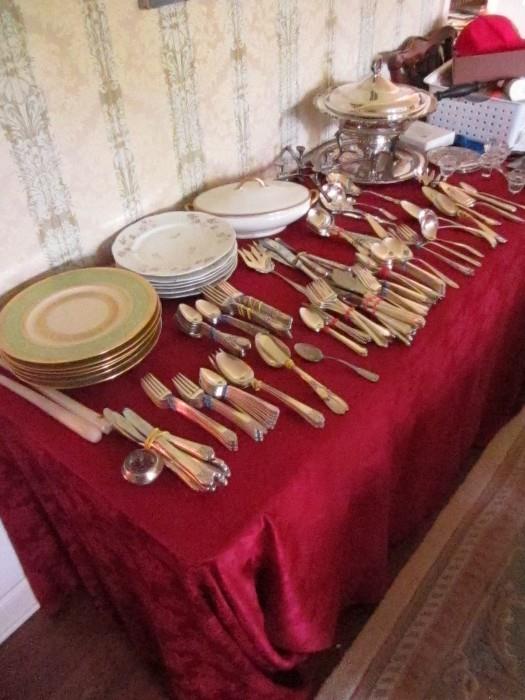 Three sets of silver plate flatware and extra pieces. china, and misc.