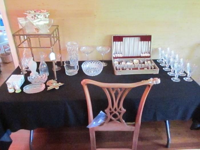 Silver plate flatware set. cut glass crystal stemware and items from preceding photo.