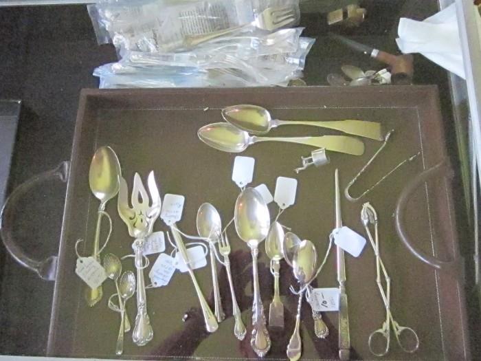 Some of the sterling flatware. also a partial set of 36 sterling pc. flatware.