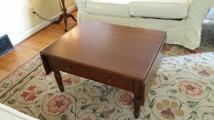 contemporary drop leaf cocktail table with 2 drawers