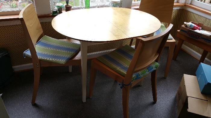 contemporary oval table and 3 chairs