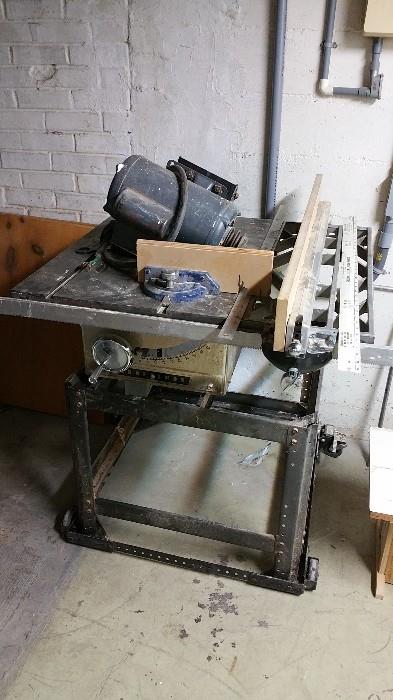industrial grade table saw on rolling stand with 2 HP motor - client says it works well
