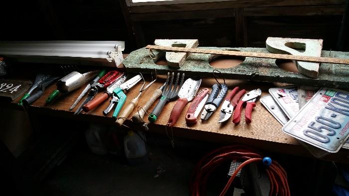 lots of garden hand tools...license plate etc