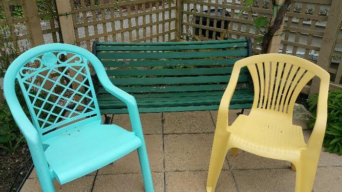 more painted plastic chairs....wooden garden bench