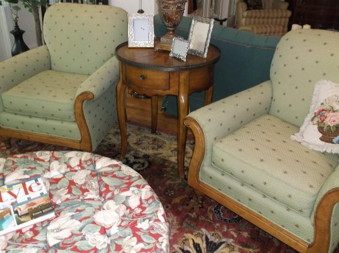 Pair of chairs w/wooden trim and small round side table 
