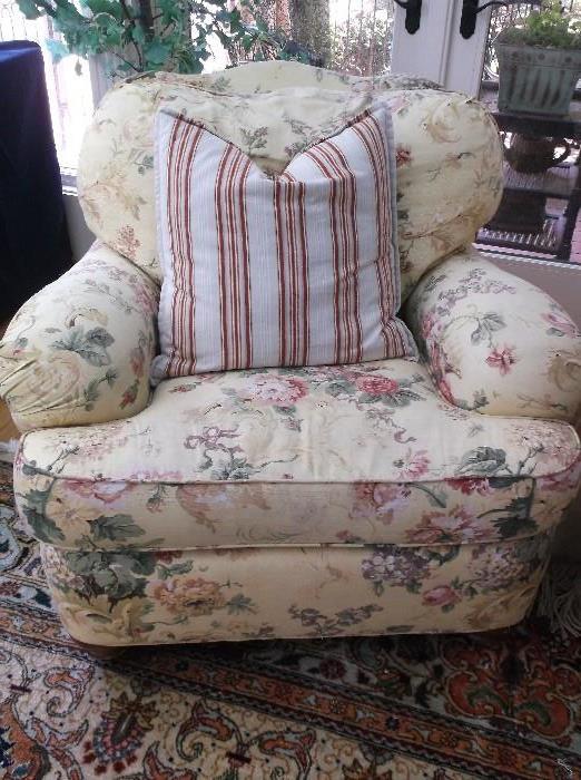 One of a pair of yellow floral upholstered chairs
