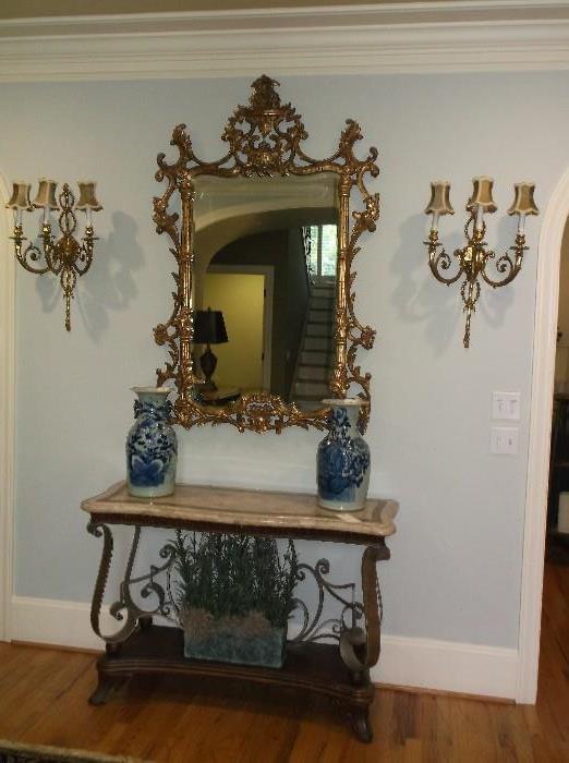 Faux stone top wrought iron console table w/two large blue and white Chinese vases