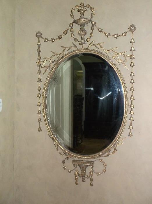 Beautiful oval mirror in metal frame