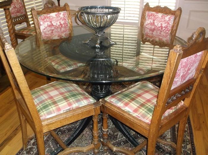 Round glass top table and eight French oak chairs