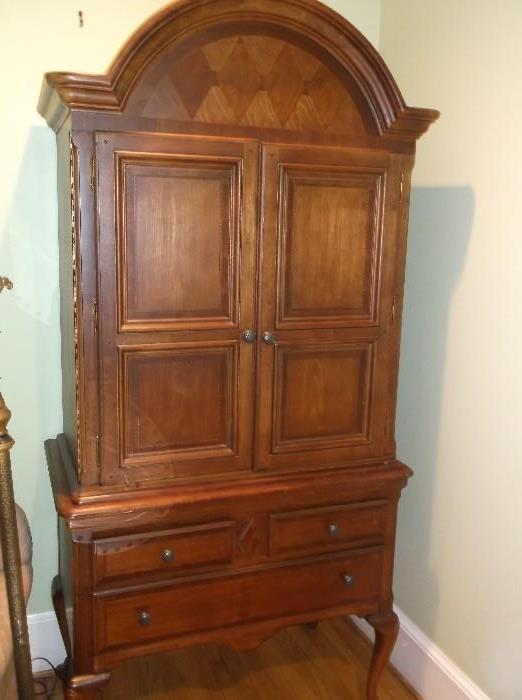 Highboy style armoire by Alexander Julian