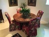 wooden round table - dining - upholstered chairs - four chairs