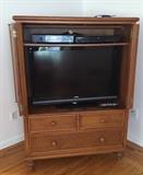 Television, Vizio and entertainment center